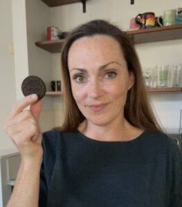 woman eating an oreo